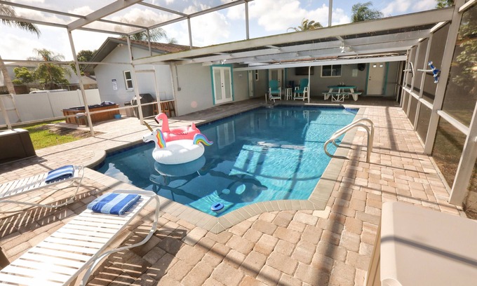 Bay Crest Park House | Experience Relaxation: 4BR Home with Heated Pool & Spa