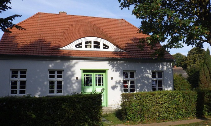 Ostseebad Wustrow Apartment | Serene Coastal Retreat with Pool and Garden Oasis