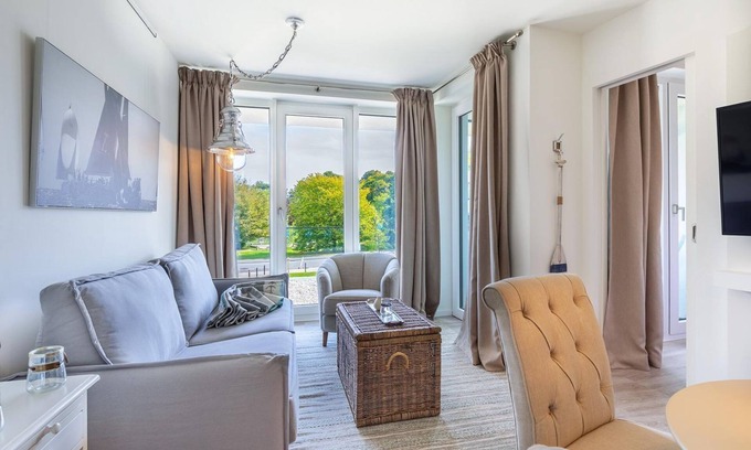 Alt-Travemunde/Ronnau Apartment | Beautifully Furnished Apartment with Park Views and Amenities