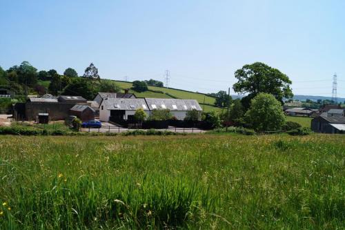 Honiton House | Historic Lower Curscombe Barn: Pet-Friendly Retreat