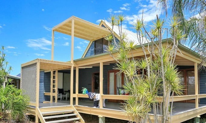 Woodgate House | Lowset A-Frame Cottage