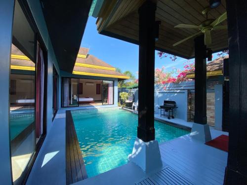 Chalong Villa | Relaxing Lris Villas: Oceanfront Stay with Pool & Hot Tub