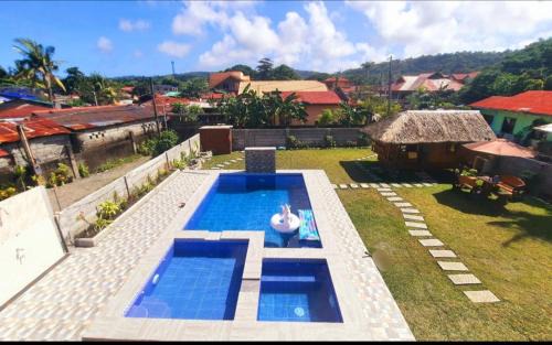 Calapan Apartment | Relax at LS Resthouse with Pool and Lush Garden