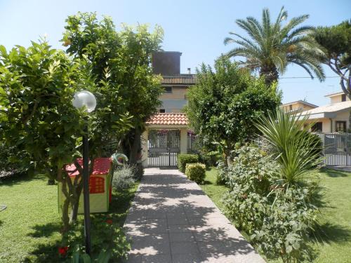 Isola Sacra Bed & Breakfast | Discover Luana Inn Holiday: Family-Friendly with Breakfast