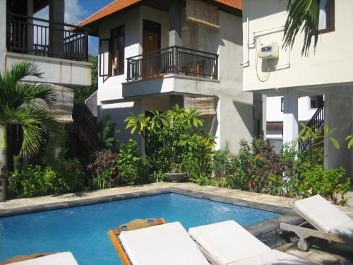 Purwakerti House | Beachfront Lucky Paradise Bungalows with Ocean View & Pool