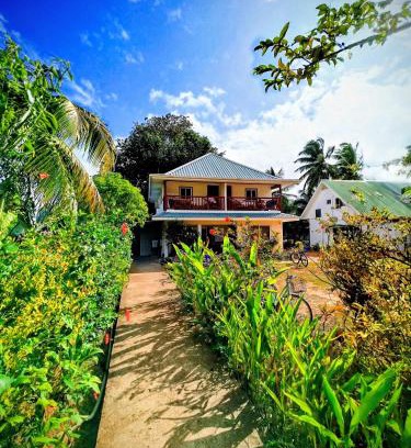 La Digue House | Discover Lucy's Guesthouse: Family-Friendly with Pool & Breakfast
