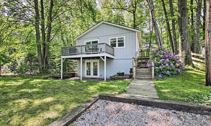 Ludington Cottage | Cozy Ludington Cottage with Yard, Deck & Fire Pit Awaits