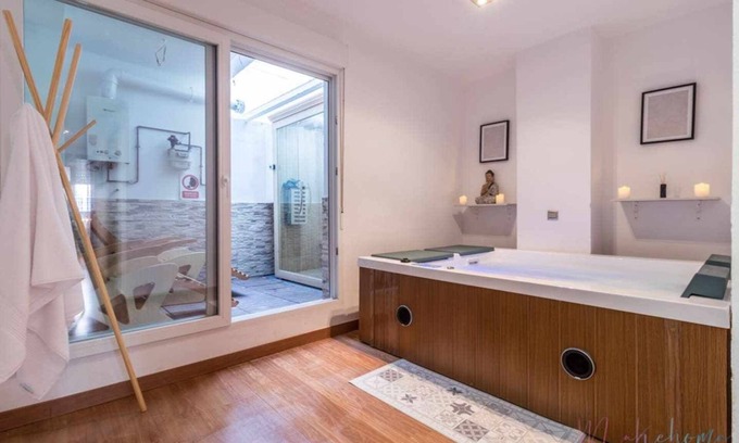 Huelva Apartment | Relaxation Awaits: Spa & Garage in Central Location