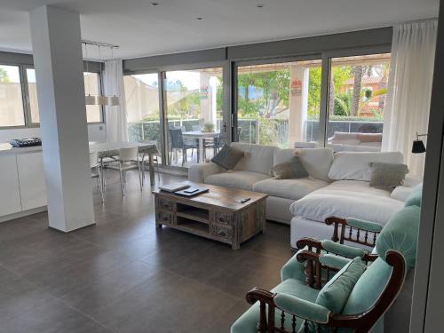 Denia Apartment | Elegant Apartment Steps from the Ocean with Pool Access