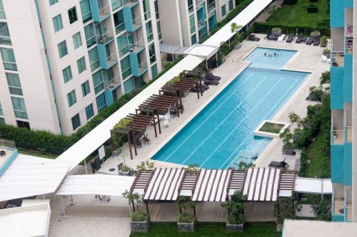 Hatillo Apartment | Elegant Condo with Pool & Laundry in San José, 4-Star Rated