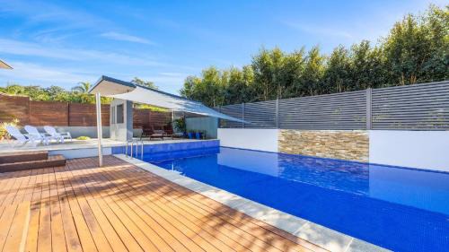 Korora House | Discover Lumière: 4-Star Hotel with Pool & Pet-Friendly Options