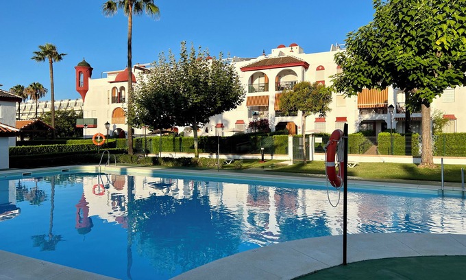 Isla Cristina Apartment | Inviting Islantilla Beachfront Apartment with Pool and Spa