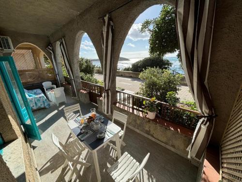 S'Archittu Apartment | Oceanfront Escape at Lungomare Chess - 4-Star Comfort