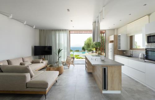 Elia Nikitis Villa | Discover Luria Homes: Beachfront Oasis with Pool & Dining