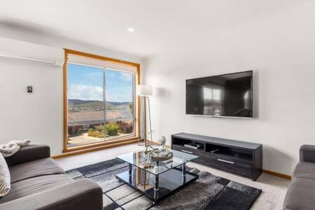 Lutana House | Family-Friendly Retreat at Lutana Large House, 4-Star Stay