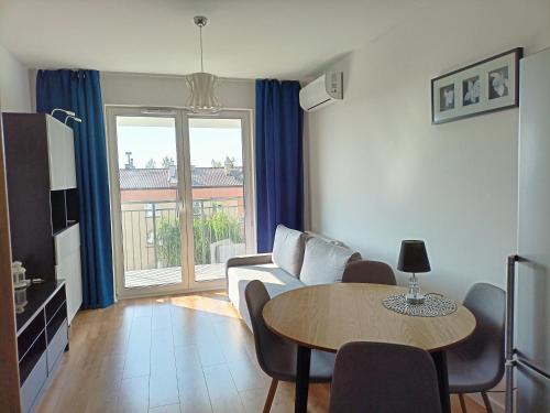 Pruszkow Apartment | Stylish Apartment Near Park in Warsaw with Free Garage
