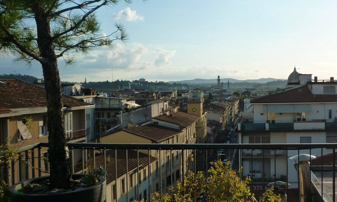 Santissima Annunziata House | Stylish Attic Retreat with Terrace and City Views