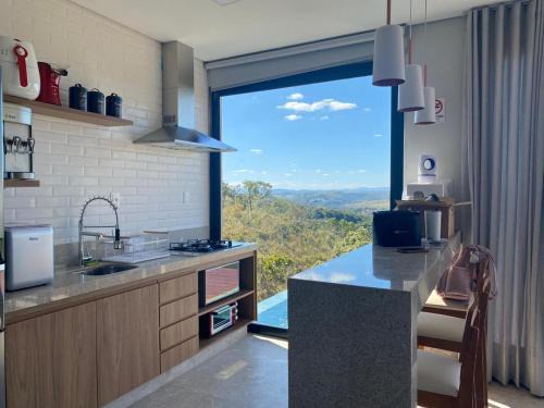 Jaboticatubas House | Experience Relaxation at Lux Lodge with Oceanfront Views