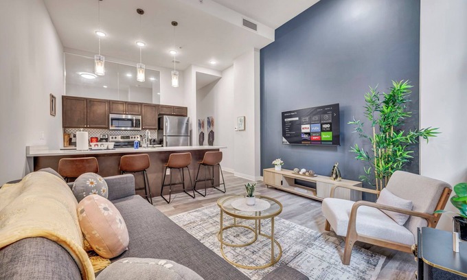 Gateway District Apartment | Luxe 1B in Heart of Downtown Pool & Spa Gym