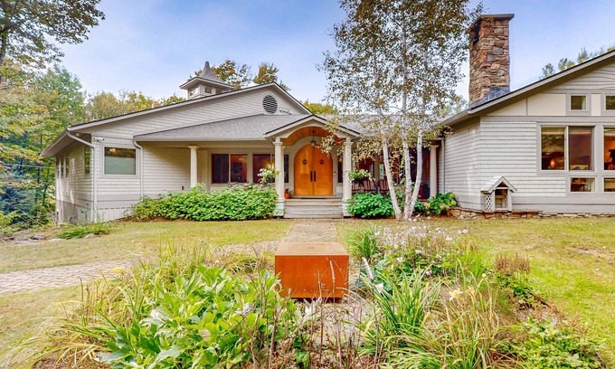 Warren House | Elegant Retreat with Hot Tub, Game Room & Beautiful Garden