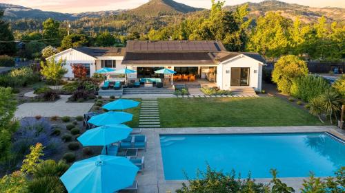 Kenwood House | Luxe Pool Spa Fire Pit Game Room Piano Sonoma Pool Retreat by AvantStay