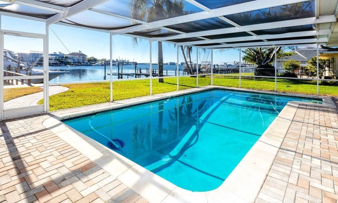 Ozona House | Elegant Waterfront Retreat with Pool in Ozona - Rated 9/10
