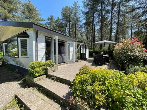 Poppel Ski Chalet | Tranquil Forest Retreat with Private Beach & Pool