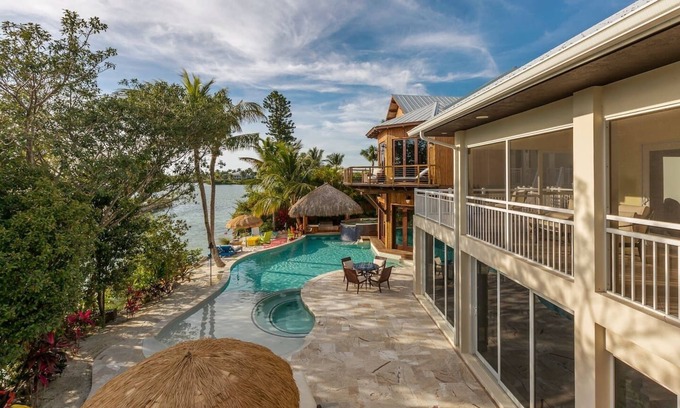 Marathon Villa | Top-Rated Waterfront Retreat with Pools, Spa & Ocean Views