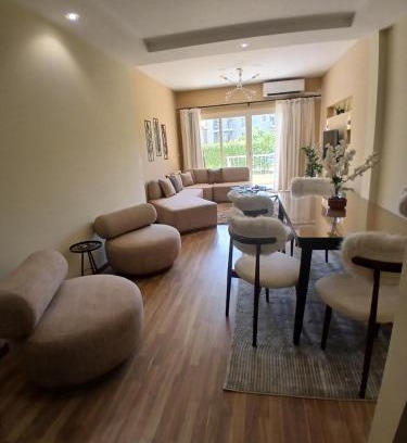 Sheikh Zayed City Apartment | Elegant Apartment with Private Garden & Pool Access