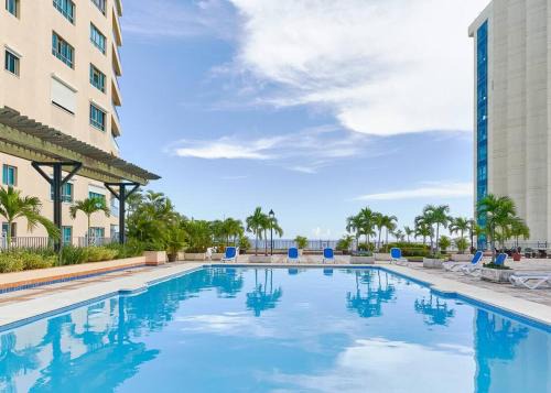 San Geronimo Apartment | Ocean View 2BDR Retreat with Pool & Breakfast Included