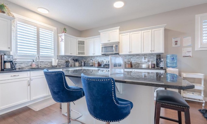 Cochrane House | Modern 3 Bedroom Home with Office and Media Room Awaits