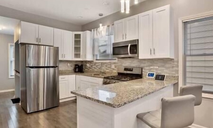 Avalon Park House | Elegant Avalon Manor with Kitchen Amenities for Your Stay