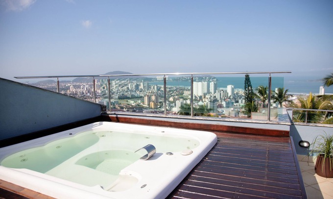 Jardim Praiano House | Immerse in Sea Views at Our Gated Beach House Retreat