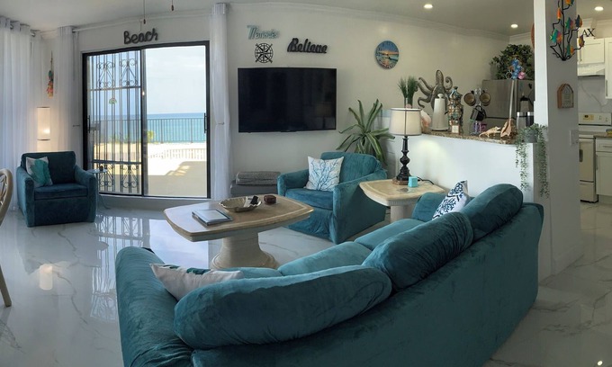 Discovery Bay Condo | Luxurious Beachfront Condo with Breath Taking Ocean, Beach and Garden Views.