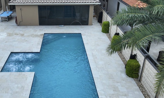 Tamiami House | Stylish Retreat with Heated Pool, BBQ & Game Room