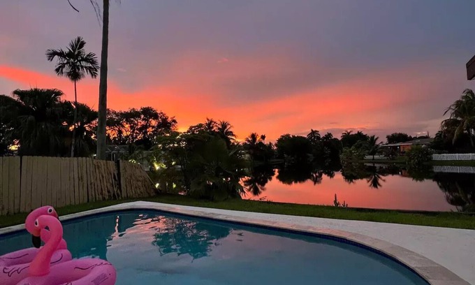 Miramar House | Serene Lake View Villa with Pool and Gaming Amenities