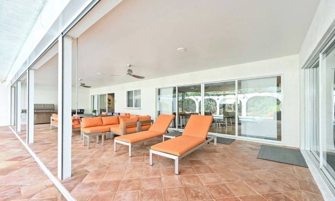 Palm River Estates House | Exceptional Naples Retreat with Heated Pool, Steps to Beach