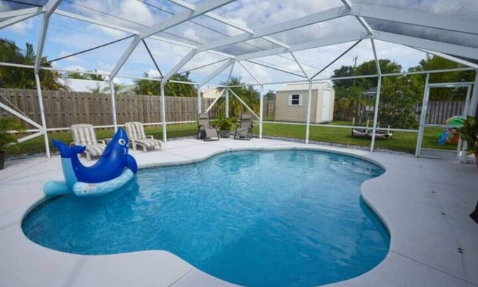 Port Saint Lucie Cottage | Elegant Pool Cottage for Two with Spa and Breakfast