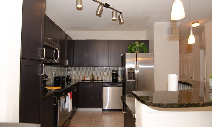 Port Tampa City Apartment | Exquisite Resort Getaway with Pool, Hot Tub & Ocean Views