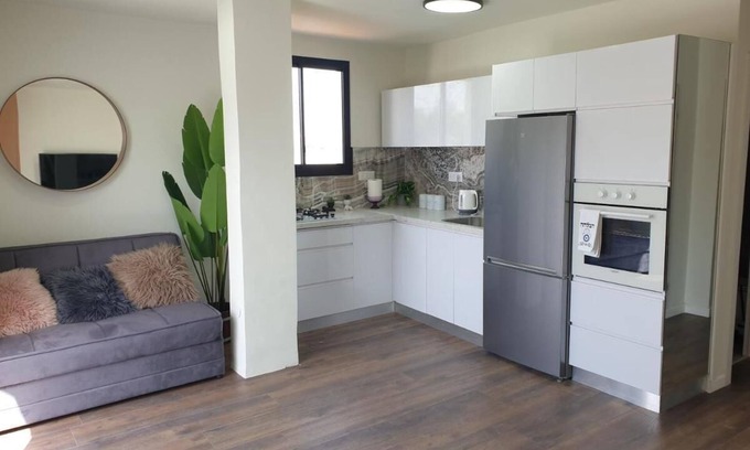 Ramat Gan Apartment | Rooftop Retreat: 2 Bedrooms with Hot Tub & Family-Friendly Amenities