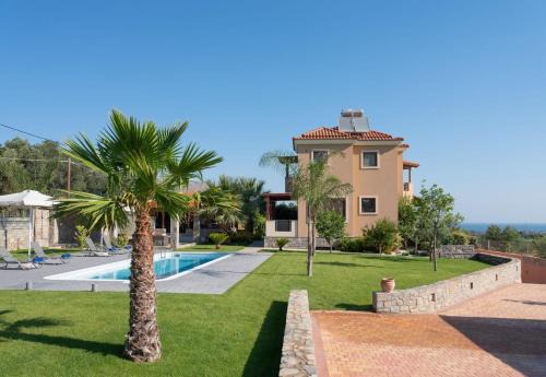 Malevizi Villa | Elegant Villa David: Oceanfront Bliss with Pool Access
