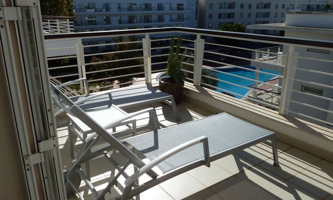 Telheiro Apartment | Chic 1 Bed Apartment with Ocean View & Pool Passes