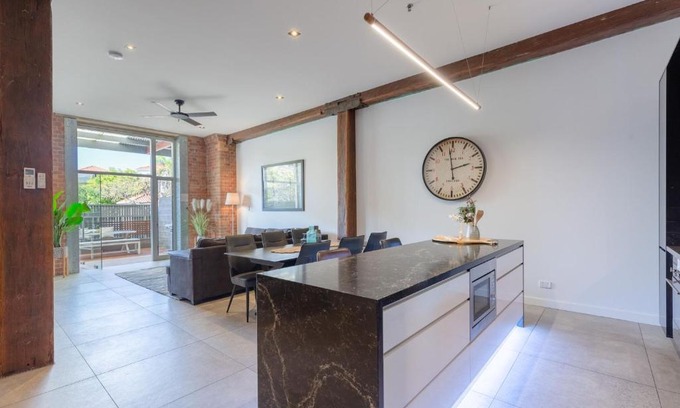 Teneriffe Apartment | Inviting 3-Bedroom Woolstore Apartment with Courtyard Oasis
