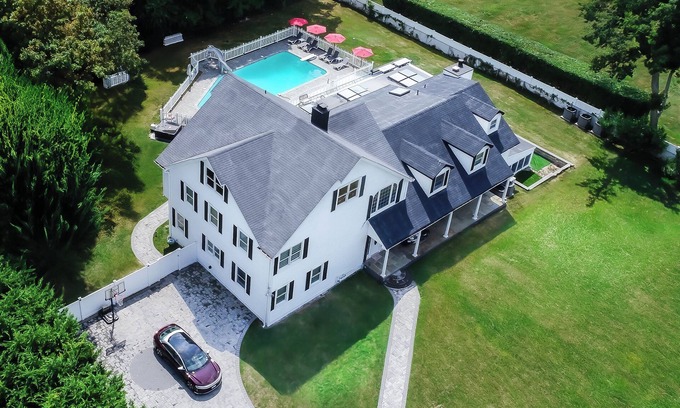 East Patchogue Villa | Indulge in an Upscale Retreat with Private Hot Tub & Pool