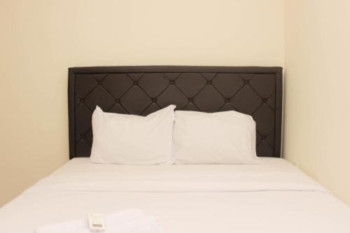 Cikarang Apartment | Cozy 2BR Retreat at Meikarta Apartment by Travelio