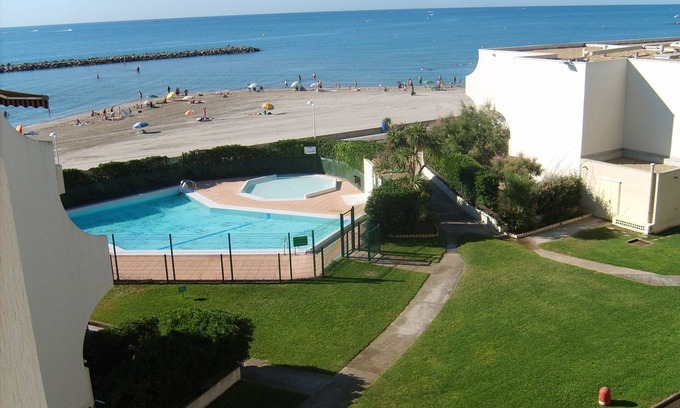 Palavas-les-Flots Apartment | Beachfront Retreat with Pool and Ocean Views - Rated 9.2/10
