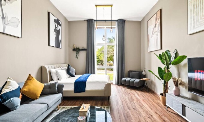 Discovery Gardens Apartment | Stylish Apartment at Discovery with Pool & Family Amenities