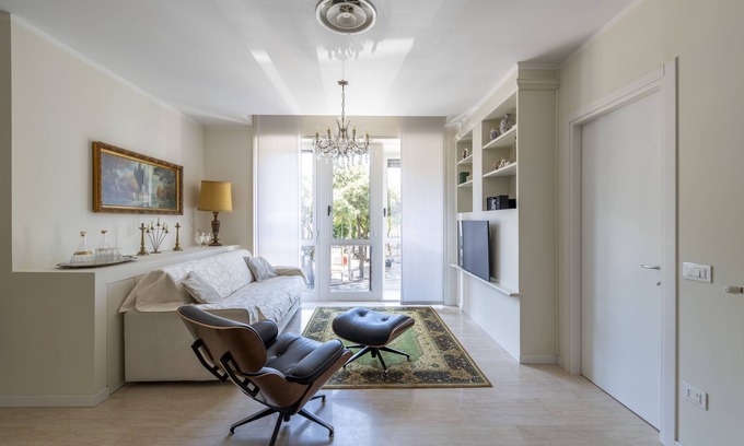 Pesaro Apartment | Elegant Apartment Facing Rossini Theater with Ocean Views