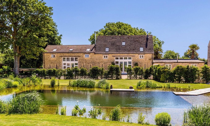 Witney House | Idyllic Barn Retreat with Pool on Scenic Cotswolds Farm