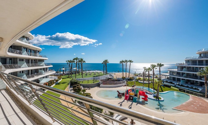 Els Arenals del Sol Apartment | Luxury Beachfront apt Infinity View. Seaview, Heated pool, 3 Jacuzzis & Gym